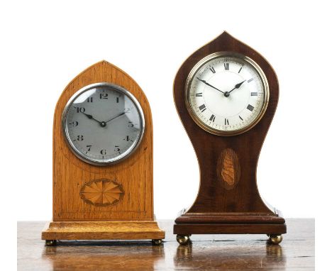Two Edwardian inlaid mantel clocksOne an oak cased lancet clock example with Arabic numberal to the dial, 22cm high overall, 