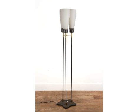 Attributed to Stilnovo A three branch black metal and brass design standard lamp, with three glass shades, 165cm high overall