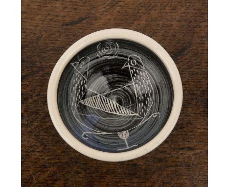 In the manner of William Newland (1919-1998) Studio ceramic sgraffito dish, decorated with birds, indistinct impressed seal m