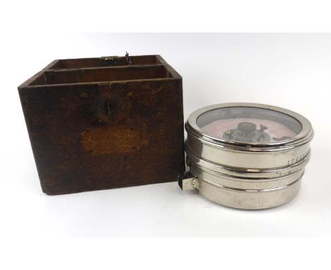 A Boddy & Ridewood pigeon clock, d. 18 cm, in an oak case