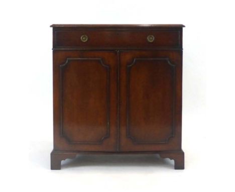 A late 19th/early 20th century mahogany cabinet, the single drawer over two doors on bracket feet, w. 83 cm   CONDITION REPOR