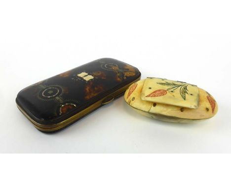 A 19th century tortoiseshell, yellow metal mounted and mother-of-pearl purse, together with a horn snuff box