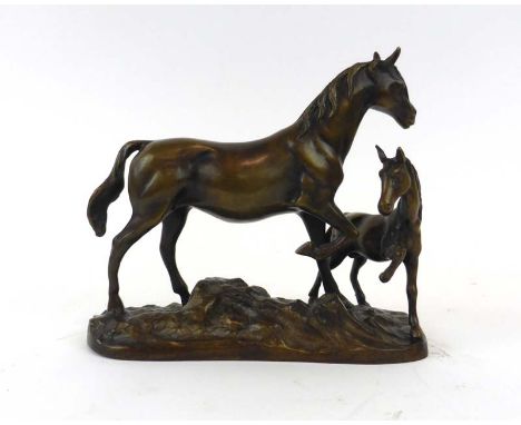 A 20th century bronze figural group modelled as a horse and foal on a naturalistic base, h. 21 cm