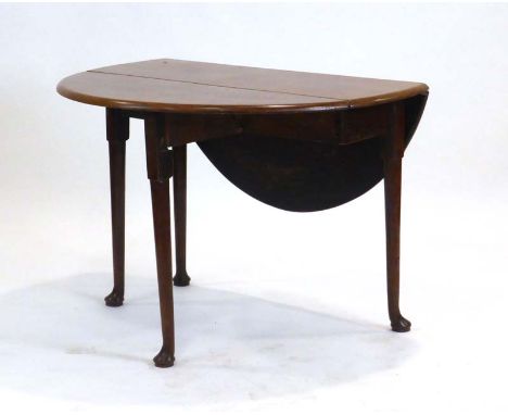 An 18th century mahogany gate-leg dining table on circular legs with pad feet, max. l. 116 cm CONDITION REPORT: Structurally 