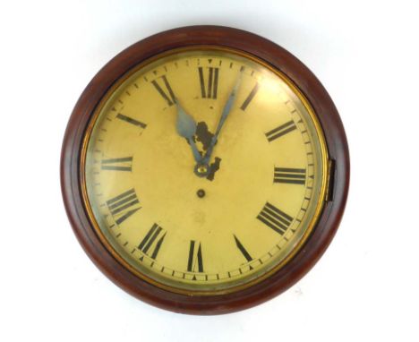 A late 19th/early 20th century station-type wall clock, the enamelled face with Roman numerals within a mahogany case, d. 40 