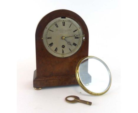 A late 19th century mantel clock by Goldsmiths and Silversmiths Co. Ltd of London, the silvered dial with Roman numerals with