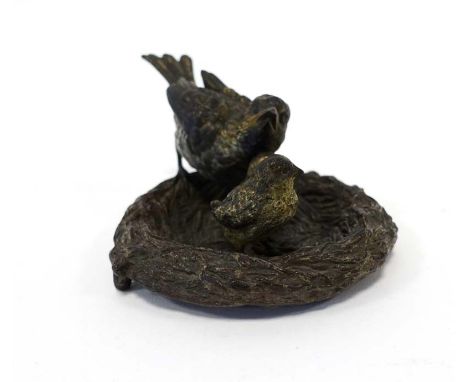 Franz Xaver Bergmann (1861-1936), a cold-painted bronze modelled as a bird's nest with a mother and two young, stamped 'Gesch