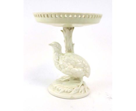 A Royal Worcester blanc de chine tazza, the base modelled as a standing bird, h. 20 cm CONDITION REPORT: Plateau has been ove