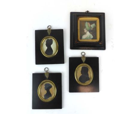A 19th century miniature oil head and shoulders portrait, 8 x 6 cm, together with three silhouettes 
