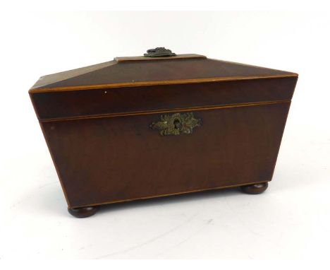 A 19th century mahogany and strung tea caddy of sarcophagus form on bun feet, w.  29 cm