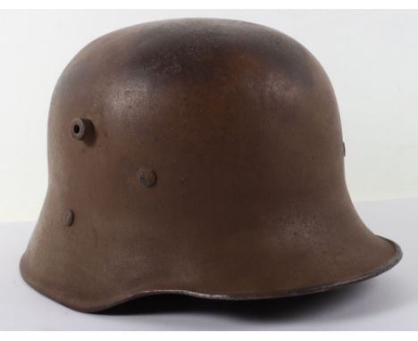 WW1 Austrian Steel Combat Helmet, nice example of an Austrian steel combat helmet retaining much of the original light brown 