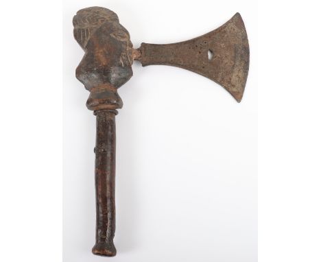 African Songye Tribal Axe, pierced iron head with reinforced outside edges, wooden haft carved with a stylised human head wit