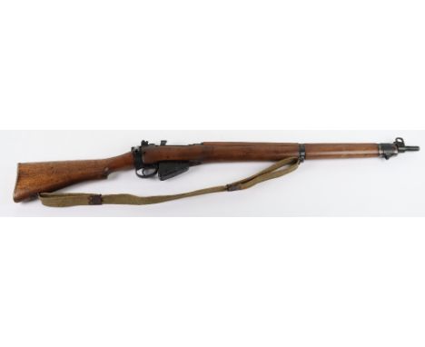 Deactivated No4 Mk1 .303 Rifle by Enfield, with original wood work, blackened metal parts (some light pitting). Complete with