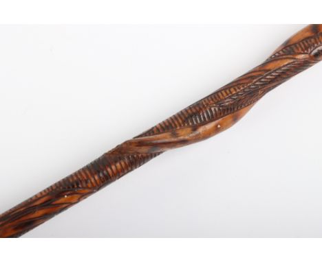 Zulu Hardwood Knobkerry Circa 1870, 88cms with small spherical head; and a walking stick carved in relief with a snake wrappe