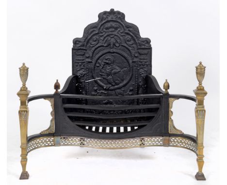 A George III style iron and brass serpentine front grate, with vase turned finials, 95 cm wide  See illustration