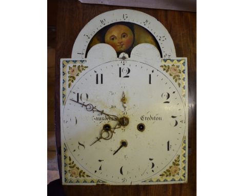 A longcase clock movement, the painted dial with a phase of the moon, and an eight day movement, 31 cm wide, and a longcase c