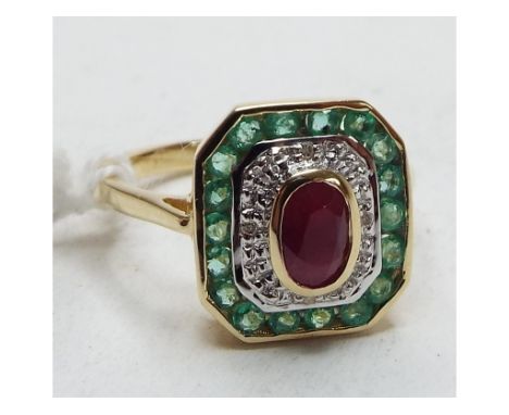 An Art Deco style 9ct gold, ruby, diamond and emerald ring