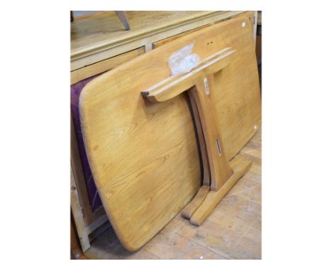 An elm dining table, probably Ercol, 150 cm wide, a cheval dressing mirror, and a bookcase (3)