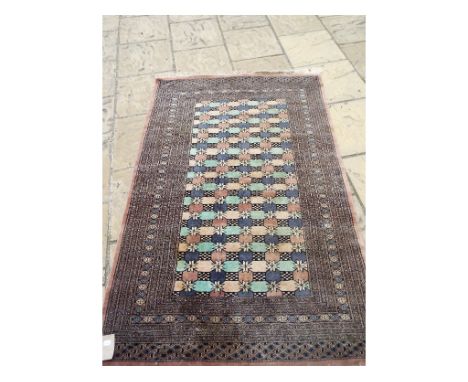 An Eastern carpet, 280 x 190 cm, and another rug (2)
