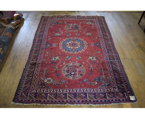 An Eastern carpet, 235 x 165 cm