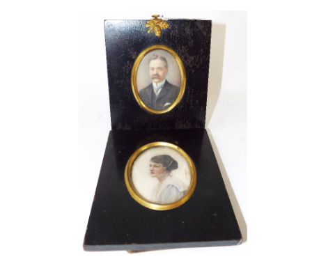 An oval bust portrait miniature, of a gentleman with a moustache, watercolour on ivory, 7 x 5 cm, and his pair (2)