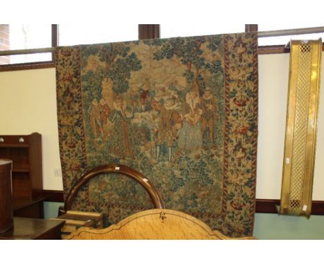 19th century French woolen tapestry woven with courtly figures playing badminton within a floral border (Vertical tear to cen
