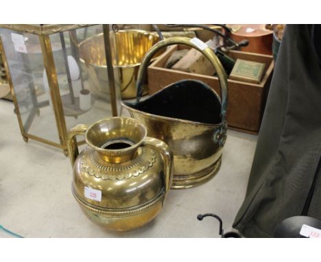 Brass coal helmet and brass vase