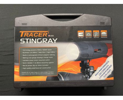 Tracer Stingray Gun Light, brand new in box with all accessories, charger, plugs, lens covers, etc. 