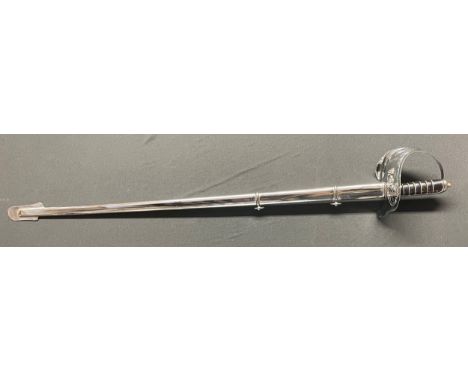 Reproduction British ERII Pattern Officers Dress Sword with heavy plated fullered etched blade 850mm in length. No edge to bl