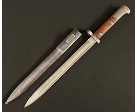 Czechoslovakian VZ24 Bayonet with single edged fullered blade 298mm in length. No makers marks. Wooden grips. Working release