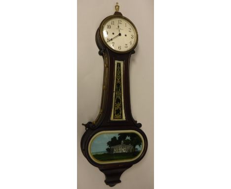 An American banjo wall clock by the New Haven Clock Company the silvered dial with Arabic numerals over a shaped flared trunk