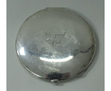 An early to mid 20th Century Dutch silver compact stamped "800" and engraved "Be good Hub" to front