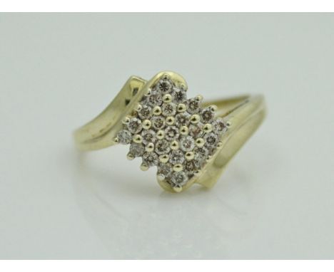 A ladies 9ct yellow and white gold ring set with a central panel of twenty-five small diamonds,  approx diamond weight .5 ct.