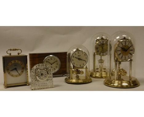 Three various modern dome top clocks by Kundo, Hermle, Halles, a Smiths oak dome cased clock, walnut cased mantel clock, Stai