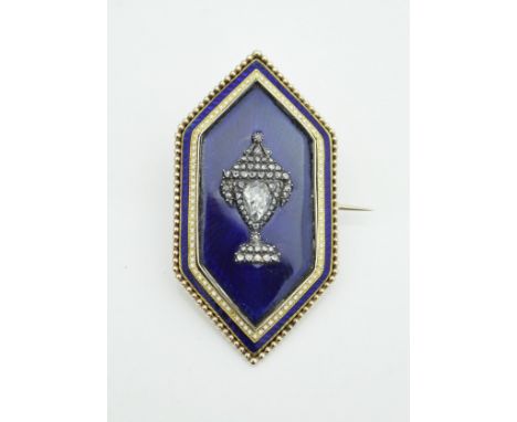 A Georgian diamond set and guilloche enamel mourning brooch of lozenge form, the central panel set with diamond encrusted urn