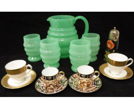 A 1930's jade green glass lemonade set of jug and four tumblers, a Birks Rawlins &amp; Co. of Stoke on Trent set of four coff