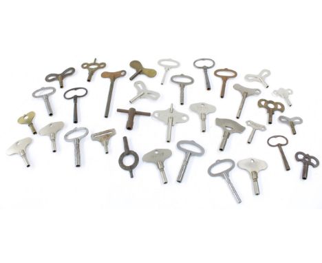 Large quantity of various mantel clock keys; also a quantity of small crank handle clock winding keys 