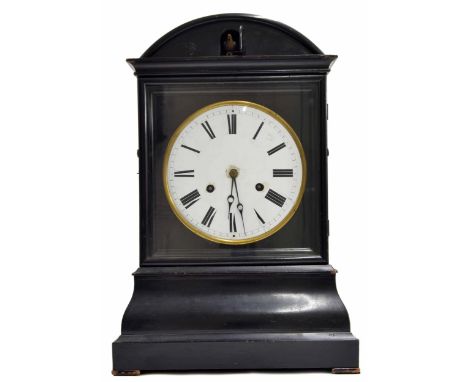 Black Forest ebonised two train cuckoo clock striking on a gong attached to the back door, the 7.25" white dial within a glaz