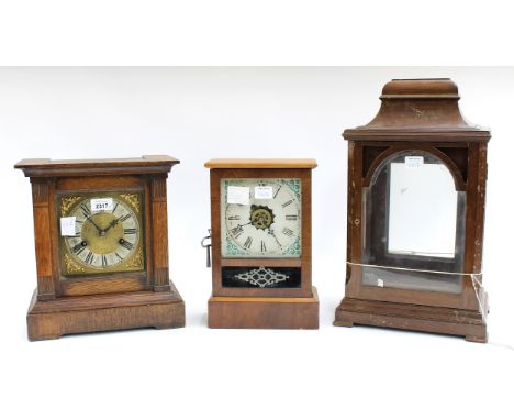 German oak ting-tang bracket clock 12" high (pendulum); also an American walnut brass mantel timepiece, 12" high (pendulum) a