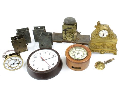 Various incomplete clocks and clock movements in need of restoration and two electric longcase clock pendulums and bobs 