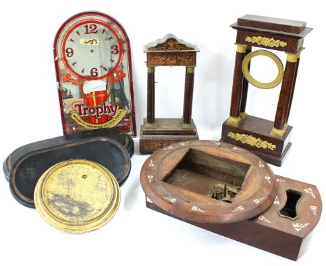 Two old portico clock cases, drop dial clock case, various clock stands and a Whitbread Trophy advertising clock mirror 