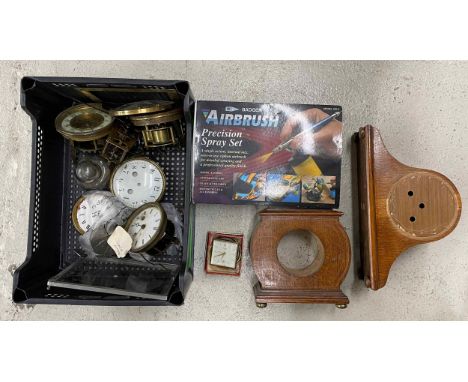 Small quantity of complete and incomplete various clock movements;&nbsp;also two empty oak mantel clock cases and a Badger ai