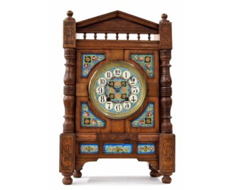 Oak and coloured pottery mounted Arts &amp; Crafts two train mantel clock,&nbsp;the movement with outside countwheel striking