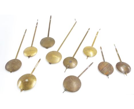 Ten medium size mantel and wall clock pendulums&nbsp;(10) 