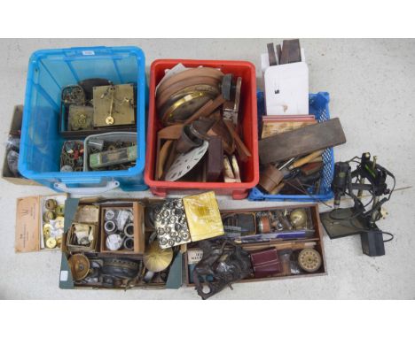Large quantity of clock movement parts and fittings, including a small selection of tools 