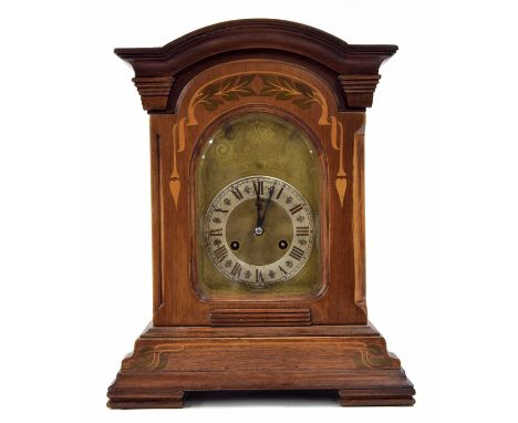 Mahogany and inlaid Art Nouveau style mantel clock, the Jungans movement striking on five rods, the 6" brass arched dial with