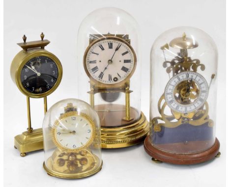 Brass drumhead gravity mantel clock, the back plate inscribed British Make, PAT 15238/19, the 3.25" painted glass dial within
