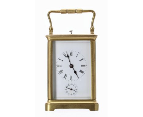 Repeater alarm carriage clock striking on a gong, within a corniche gilded brass case, 6.5" high (key) 