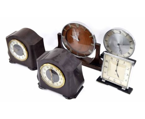 Smiths Bakelite eight day mantel clock striking on a gong; also a similar Smiths cased timepiece and three other various Smit