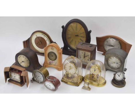 Waltham novelty mantel clock timepiece, the oval dial within mahogany cheval supports; also thirteen other various small mant